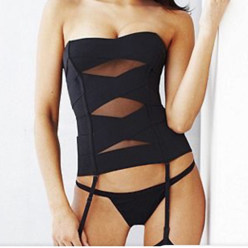 Cross banded and sheer mesh corset.